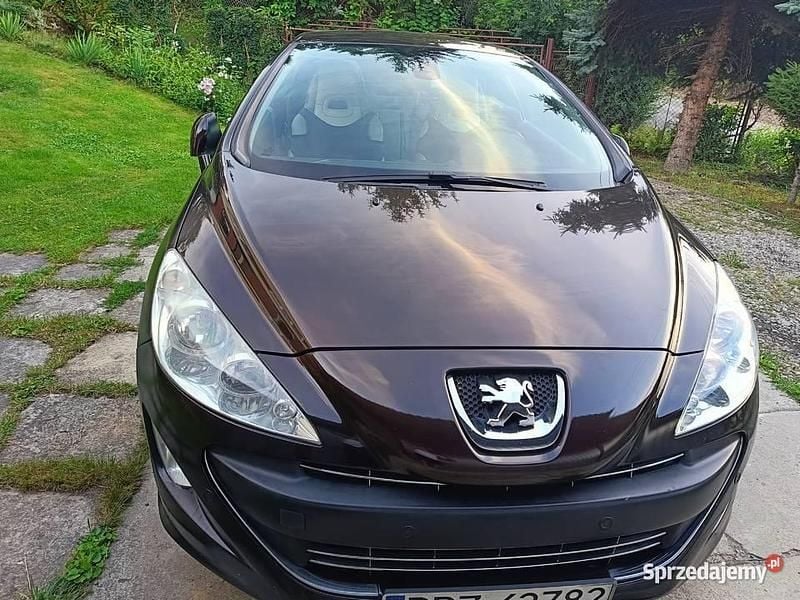Brązowy Używany 2009 Peugeot 308 CC Kabriolet | 23 200 zł - Obraz 1/4