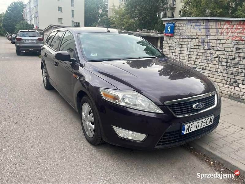 Używany Ford Mondeo 125 KM (91 kW) 2010 Wiśniowy Kombi
