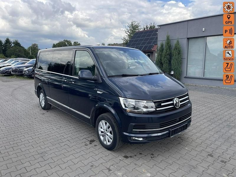 Niebieski ciemny (metalik) Używany 2018 VW Caravelle Minivan | 75 900 zł - Obraz 1/4