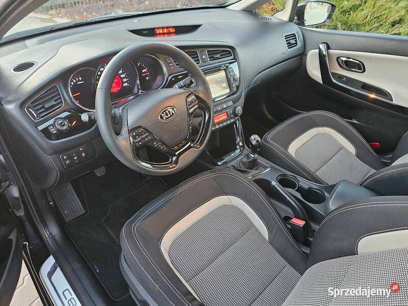 Czarny Używany 2014 Kia Ceed Kombi | 35 500 zł (Uczciwa cena) - Obraz 1/4