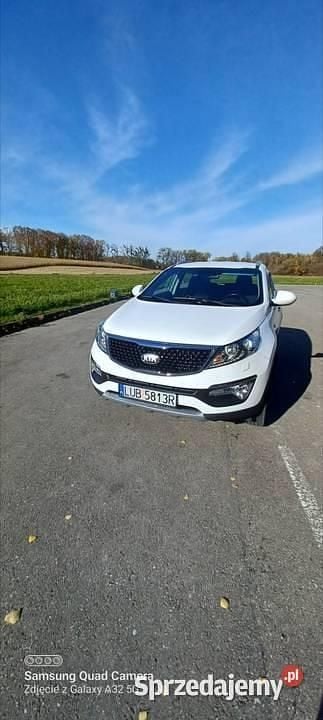 Biały Używany 2015 Kia Sportage SUV | 38 200 zł (Uczciwa cena) - Obraz 1/4