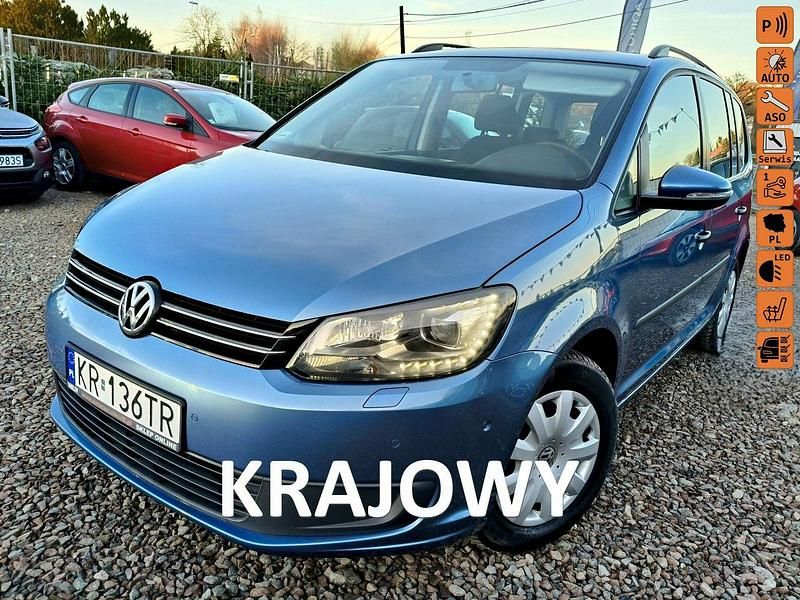 Niebieski (metalik) Używany 2012 VW Touran Minivan | 24 900 zł (Uczciwa cena) - Obraz 1/4