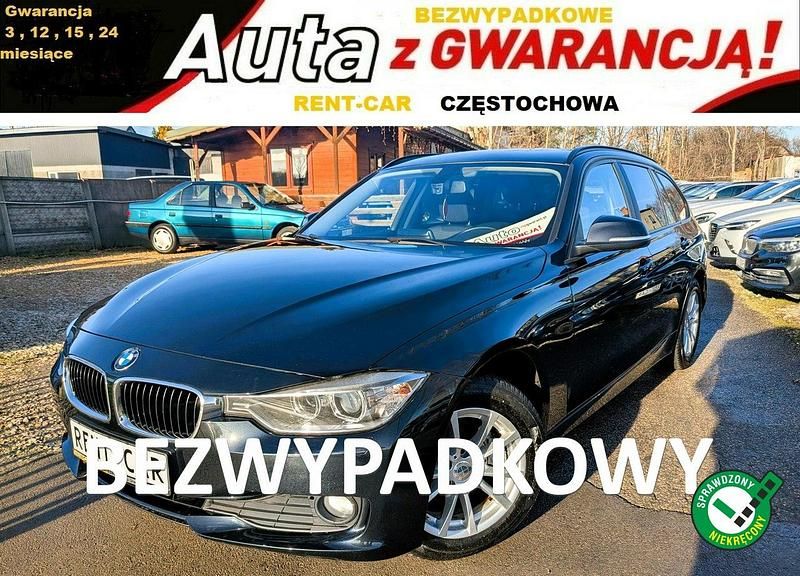 Czarny (metalik) Używany 2014 BMW 316 Sport Line Kombi | 32 900 zł - Obraz 1/4