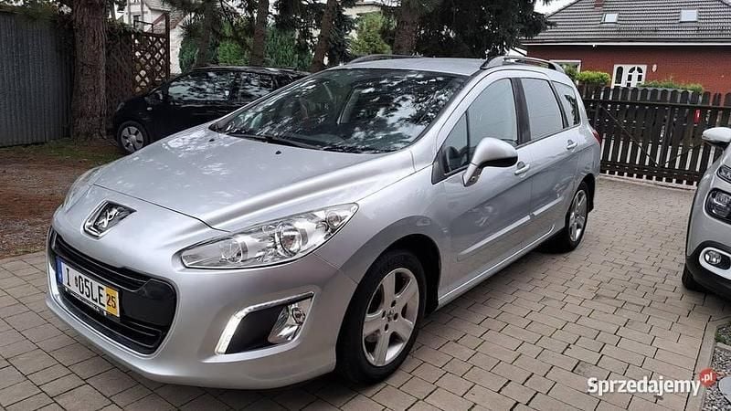 Srebrny Używany 2011 Peugeot 308 Premium Kombi | 15 900 zł (Dobra cena) - Obraz 1/4