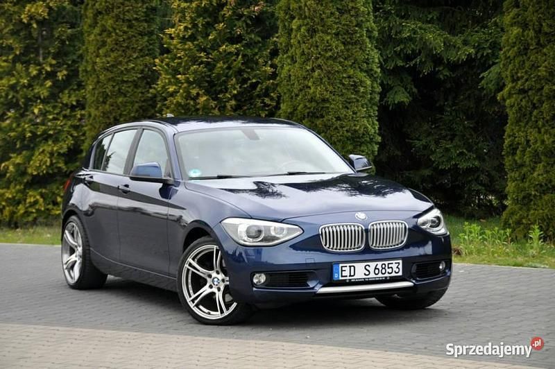 Granatowy Używany 2012 BMW 120 Sport Line Hatchback | 34 900 zł - Obraz 1/4