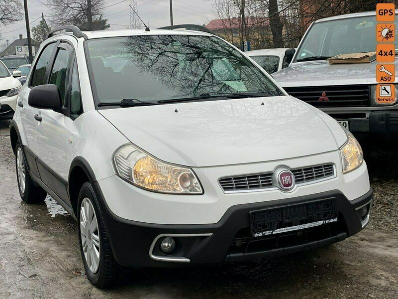 Biały Używany 2012 Fiat Sedici SUV | 31 700 zł (Uczciwa cena) - Obraz 1/4