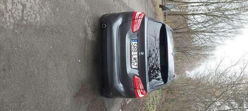 Szary Używany 2016 BMW 218 Minivan | 49 000 zł (Dobra cena) - Obraz 1/4