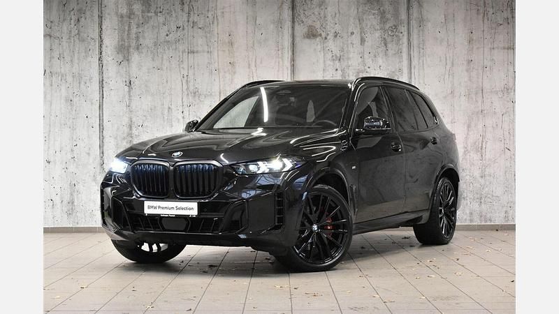 Czarny szafir metalizowany Używany 2024 BMW X5 Comfort Edition SUV | 408 800 zł - Obraz 1/3