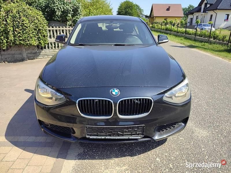 Czarny Używany 2013 BMW 114 Sport Line Hatchback | 15 900 zł - Obraz 1/4