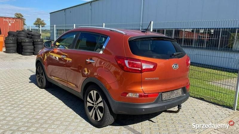 Pomarańczowy Używany 2013 Kia Sportage 2 SUV | 36 400 zł (Uczciwa cena) - Obraz 1/4