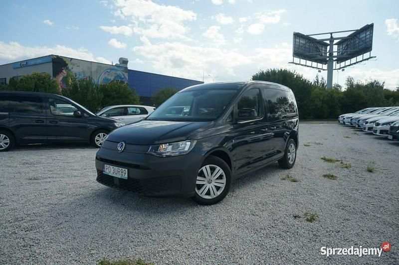Niebieski ciemny (metalik) Używany 2021 VW Caddy Minivan | 83 500 zł (Drogi) - Obraz 1/4