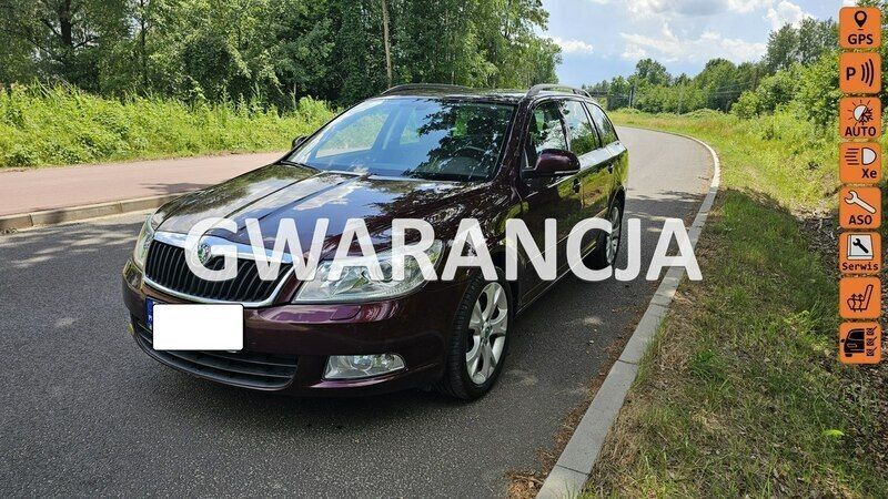 Bordowy (metalik) Używany 2013 Skoda Octavia Kombi | 22 300 zł (Super Cena) - Obraz 1/4