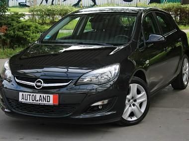 Czarny Używany 2014 Opel Astra Energy Hatchback | 31 999 zł - Obraz 1/4