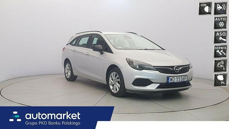 Srebrny Używany 2021 Opel Astra Edition Kombi | 49 850 zł (Uczciwa cena) - Obraz 1/4