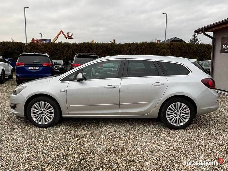 Srebrny Używany 2014 Opel Astra Kombi | 22 990 zł (Uczciwa cena) - Obraz 1/4