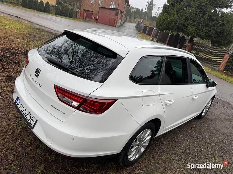Biały Używany 2014 Seat Leon Kombi | 24 000 zł (Uczciwa cena) - Obraz 1/4
