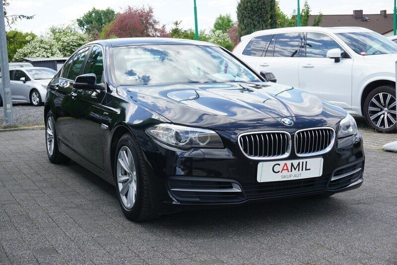Używany BMW 518 150 KM (110 kW) 2016 Czarny Sedan/Limuzyna