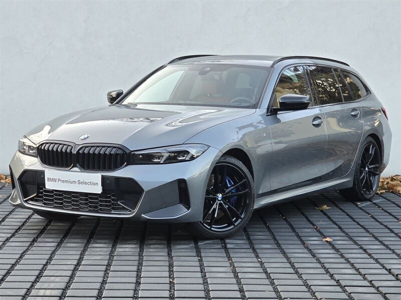 Szary skyscraper m metalizowany Używany 2023 BMW 320 Comfort Edition Kombi | 295 000 zł - Obraz 1/3