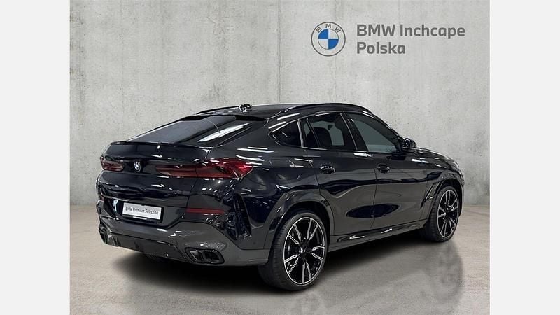 Używany BMW X6 M Sport 530 KM (389 kW) 2024 Czarny szafir metalizowany SUV