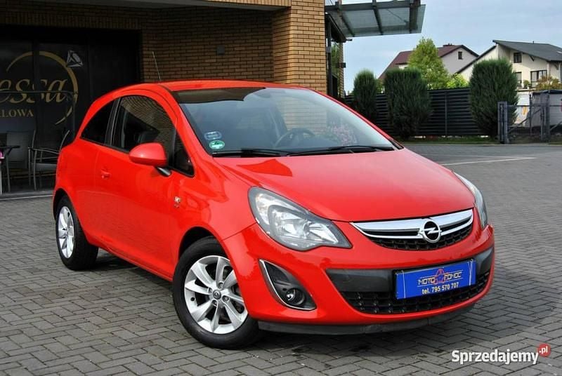 Czerwony (metalik) Używany 2014 Opel Corsa Coupe | 28 900 zł (Dość drogi) - Obraz 1/4