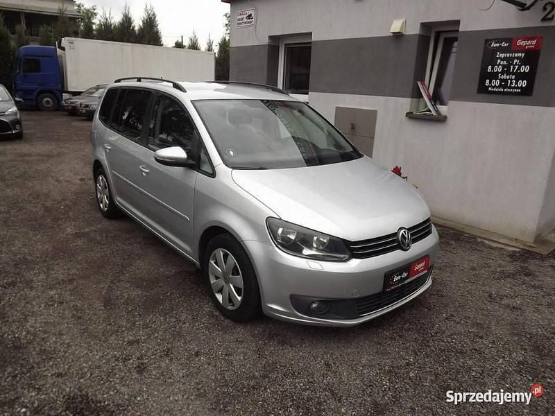 Srebrny (metalik) Używany 2013 VW Touran Minivan | 26 900 zł (Dobra cena) - Obraz 1/4
