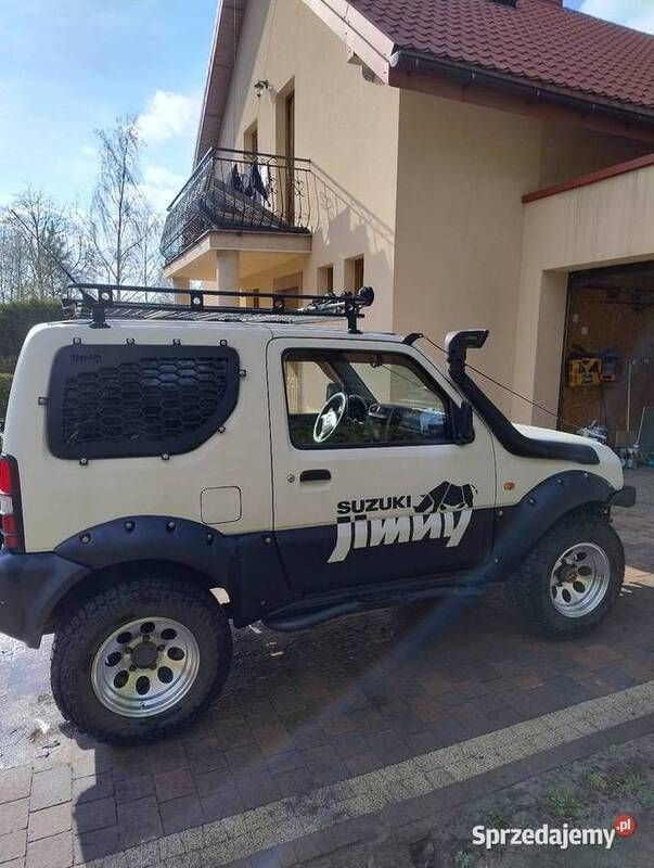 Biały Używany 2010 Suzuki Jimny SUV | 37 000 zł (Dość drogi) - Obraz 1/4