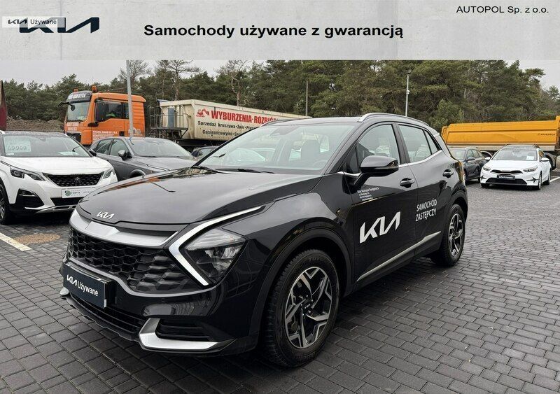 Czarny (metalik) Używany 2024 Kia Sportage 2 SUV | 100 000 zł (Uczciwa cena) - Obraz 1/4