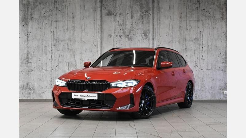 Melbourne red metallic metalizowany Używany 2023 BMW 320 Comfort Edition Kombi | 192 800 zł - Obraz 1/3