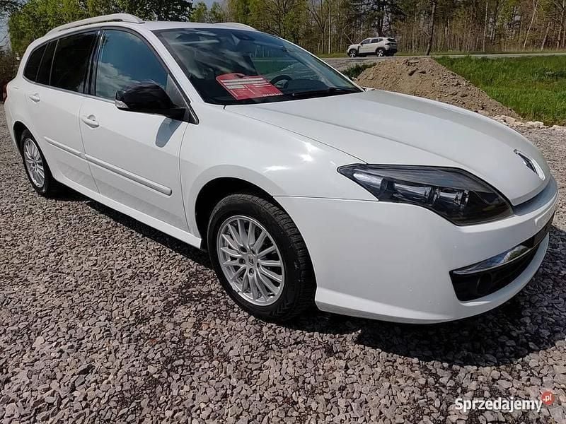 Używany Renault Laguna III 110 KM (80 kW) 2013 Biały Kombi
