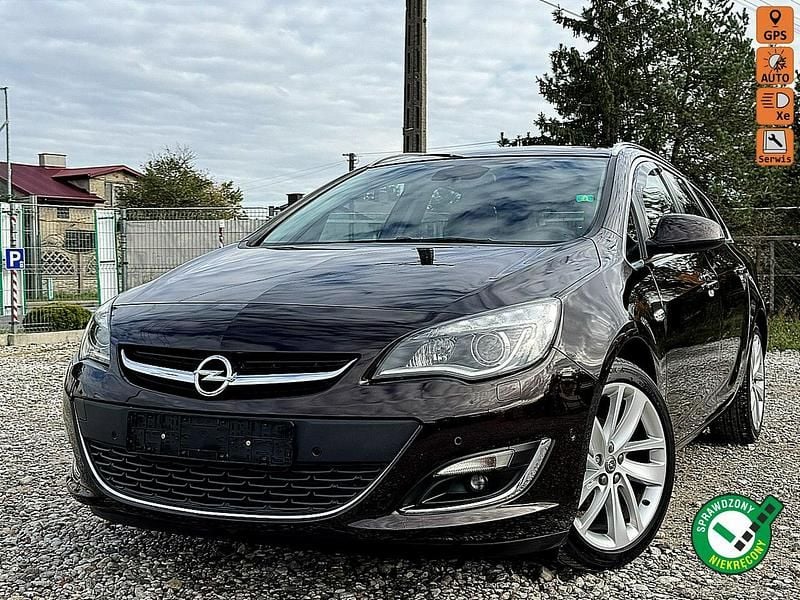 Brązowy (metalik) Używany 2014 Opel Astra Cosmo Kombi | 22 900 zł (Dobra cena) - Obraz 1/4
