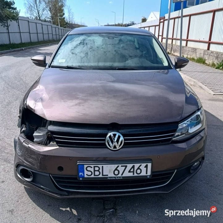 Brązowy Używany 2012 VW Jetta Highline Sedan/Limuzyna | 11 900 zł - Obraz 1/4