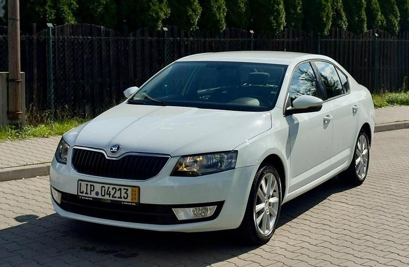 Używany Skoda Octavia Sport 105 KM (77 kW) 2014 Biały Sedan/Limuzyna