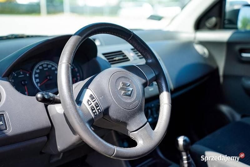 Czerwony Używany 2008 Suzuki Swift Hatchback | 8900 zł (Uczciwa cena) - Obraz 1/4