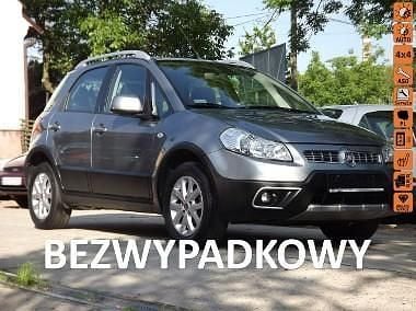 Szary Używany 2013 Fiat Sedici SUV | 37 800 zł - Obraz 1/4