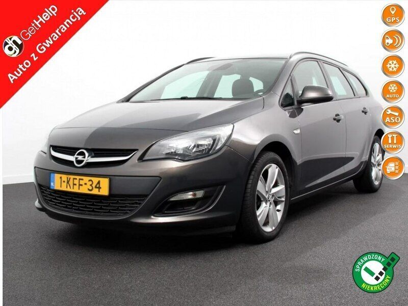 Szary Używany 2013 Opel Astra Sport Kombi | 28 900 zł (Uczciwa cena) - Obraz 1/4