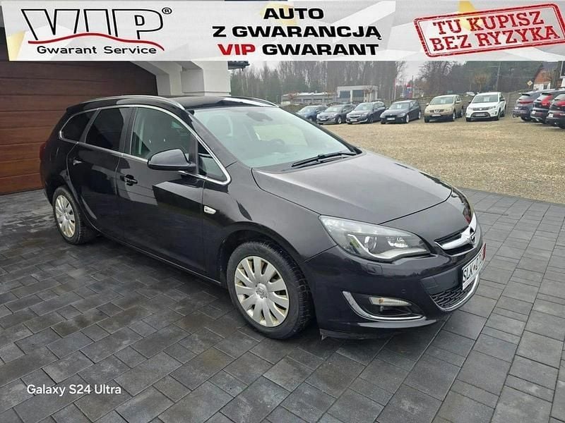 Czarny (metalik) Używany 2014 Opel Astra Kombi | 25 999 zł (Uczciwa cena) - Obraz 1/4