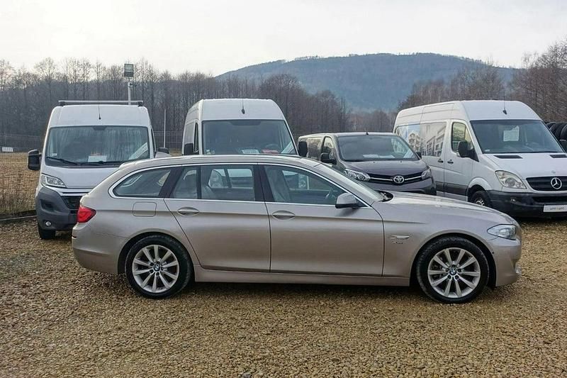 Używany BMW M550 258 KM (189 kW) 2011 Beżowy (metalik) Sedan/Limuzyna