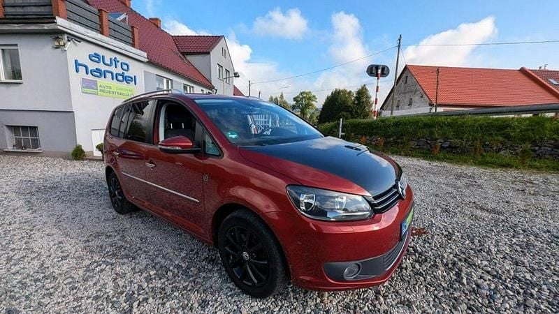 Bordowy (metalik) Używany 2014 VW Touran Minivan | 33 900 zł (Super Cena) - Obraz 1/4