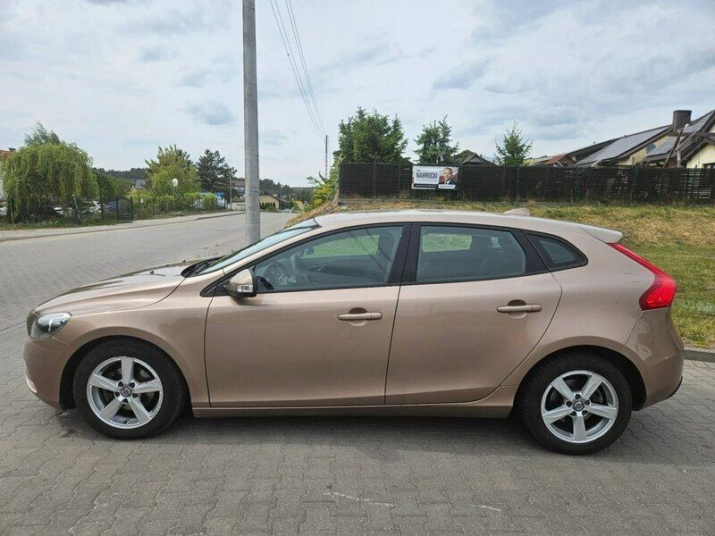Używany Volvo V40 115 KM (84 kW) 2014 Brązowy (metalik) Kombi