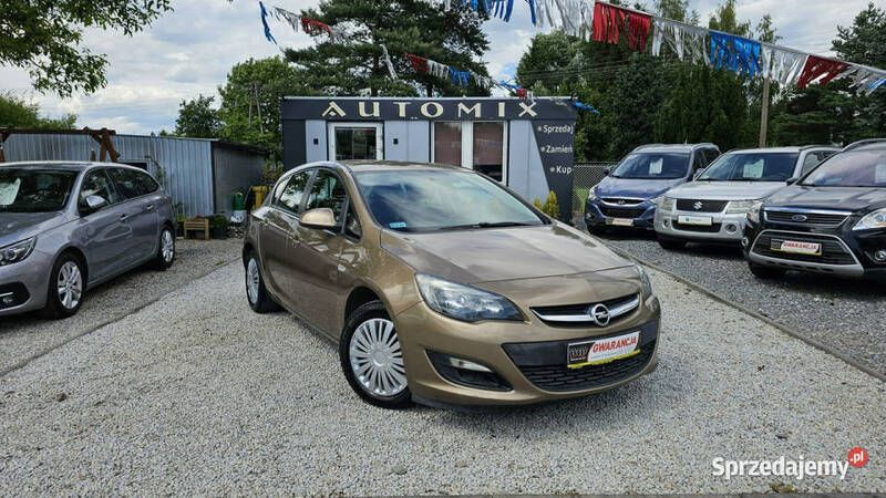 Złoty Używany 2013 Opel Astra Hatchback | 26 800 zł (Uczciwa cena) - Obraz 1/2