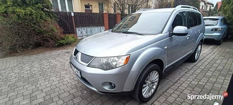 Szary (metalik, perła) Używany 2010 Mitsubishi Outlander Instyle SUV | 28 900 zł (Dobra cena) - Obraz 1/4