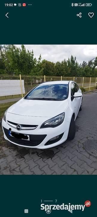 Biały Używany 2014 Opel Astra Kombi | 22 000 zł (Uczciwa cena) - Obraz 1/4