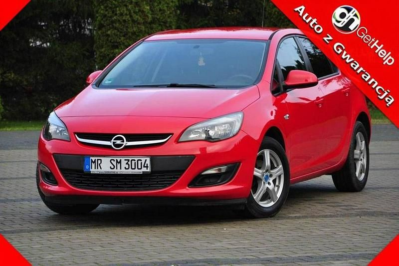 Używany Opel Astra 115 KM (84 kW) 2015 Czerwony (metalik) Sedan/Limuzyna