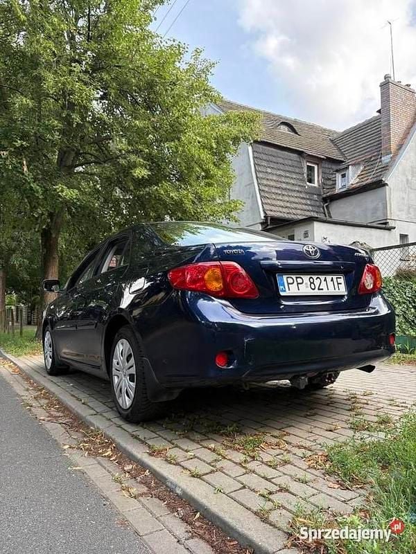 Używany Toyota Corolla 124 KM (91 kW) 2007 Granatowy Sedan/Limuzyna