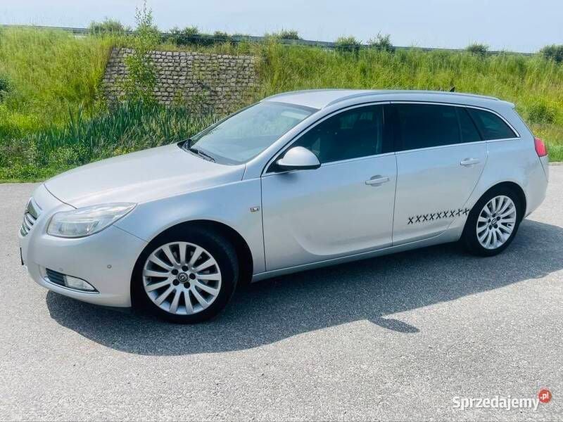 Srebrny Używany 2011 Opel Insignia Kombi | 13 999 zł (Uczciwa cena) - Obraz 1/4