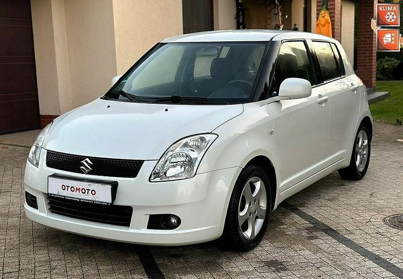 Biały Używany 2006 Suzuki Swift Comfort Hatchback | 14 900 zł (Dość drogi) - Obraz 1/4