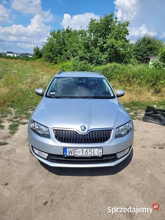 Srebrny Używany 2015 Skoda Octavia Kombi | 26 000 zł (Uczciwa cena) - Obraz 1/4