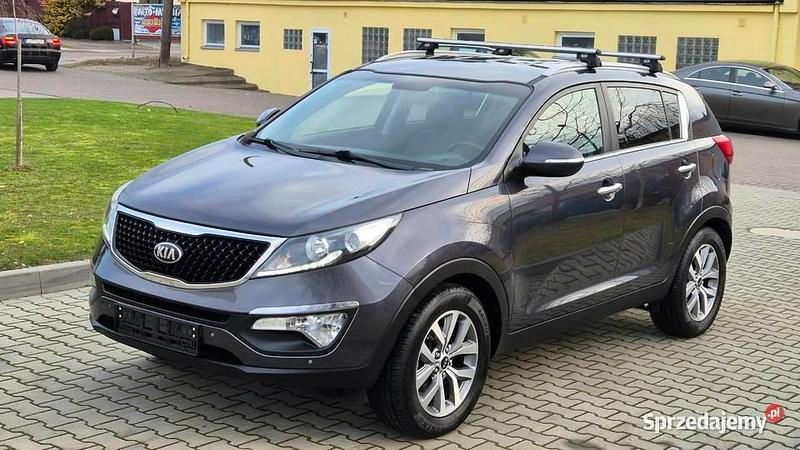 Szary Używany 2015 Kia Sportage SUV | 39 900 zł (Uczciwa cena) - Obraz 1/4