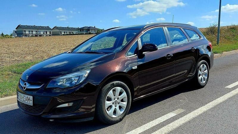 Brązowobeżowy Używany 2014 Opel Astra Kombi | 21 000 zł (Uczciwa cena) - Obraz 1/4