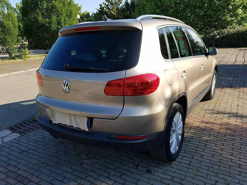 Żółtozłoty Używany 2013 VW Tiguan SUV | 49 999 zł (Dobra cena) - Obraz 1/4